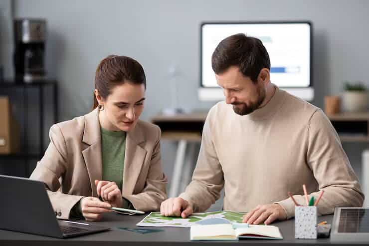 image shows a financial planner discussing financial planning
